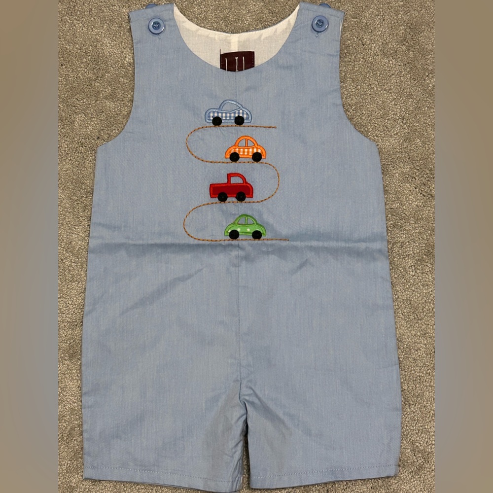 Lil Cactus blue car race track romper. Size 2T.